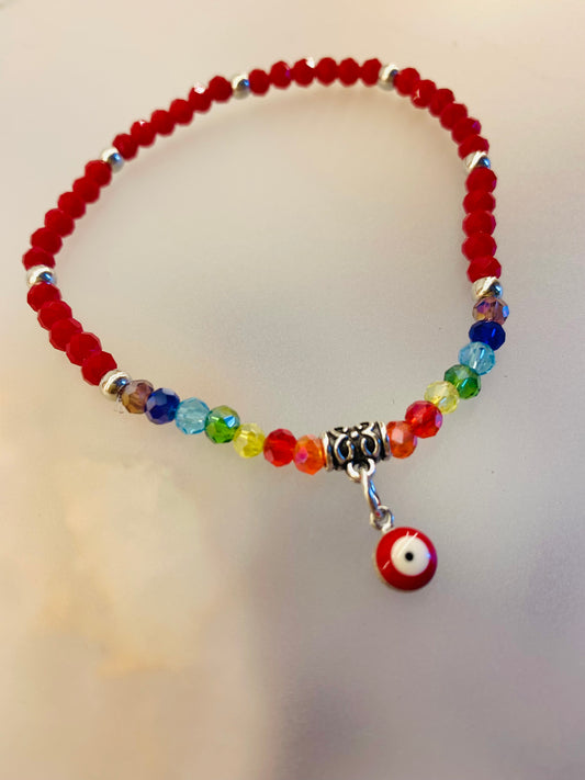 🔮 Pack Pulseras 7 Chakras + Ojo Turco Rojo | Protección Energética en Cristal Facetado 4mm (12 unidades)