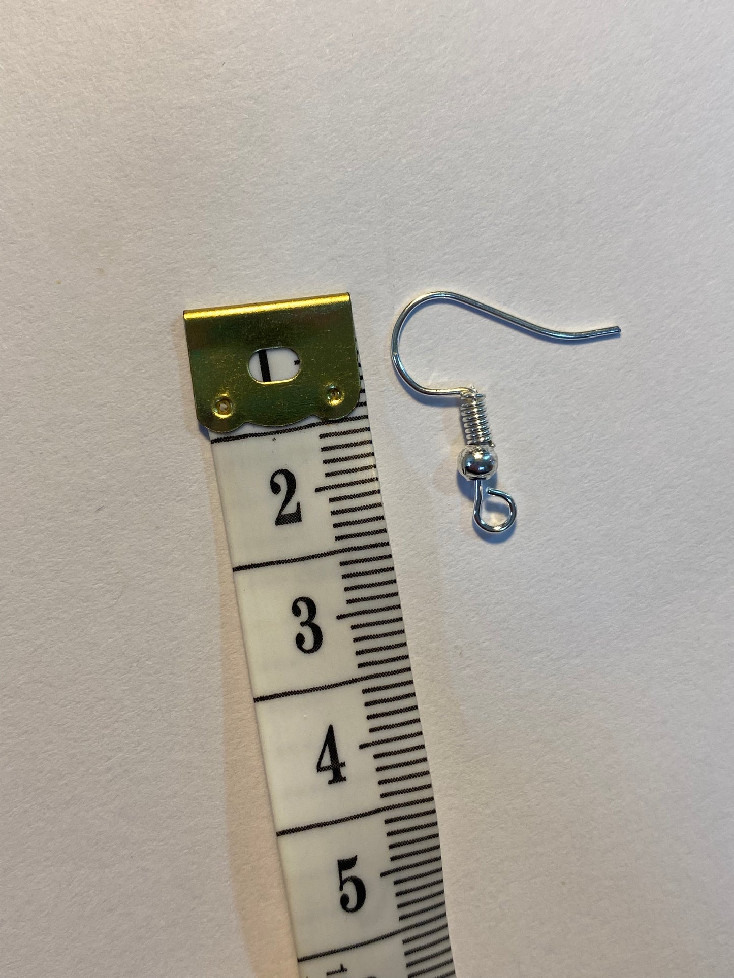 Ganchos para aretes plateados (20 unidades)