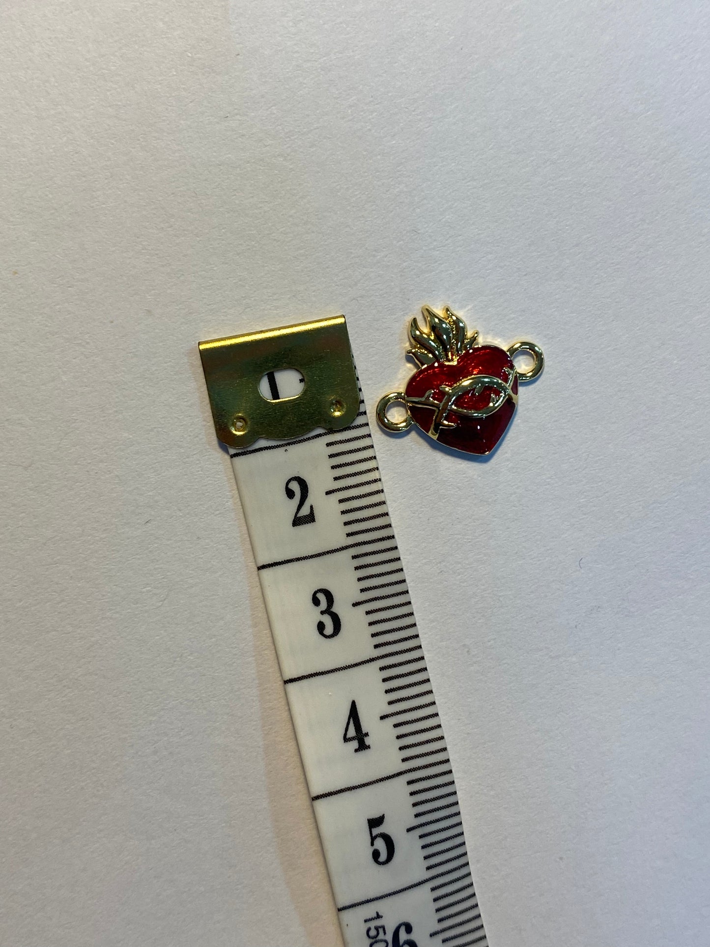 Mini dije de corazón con baño oro 1,5 cm
