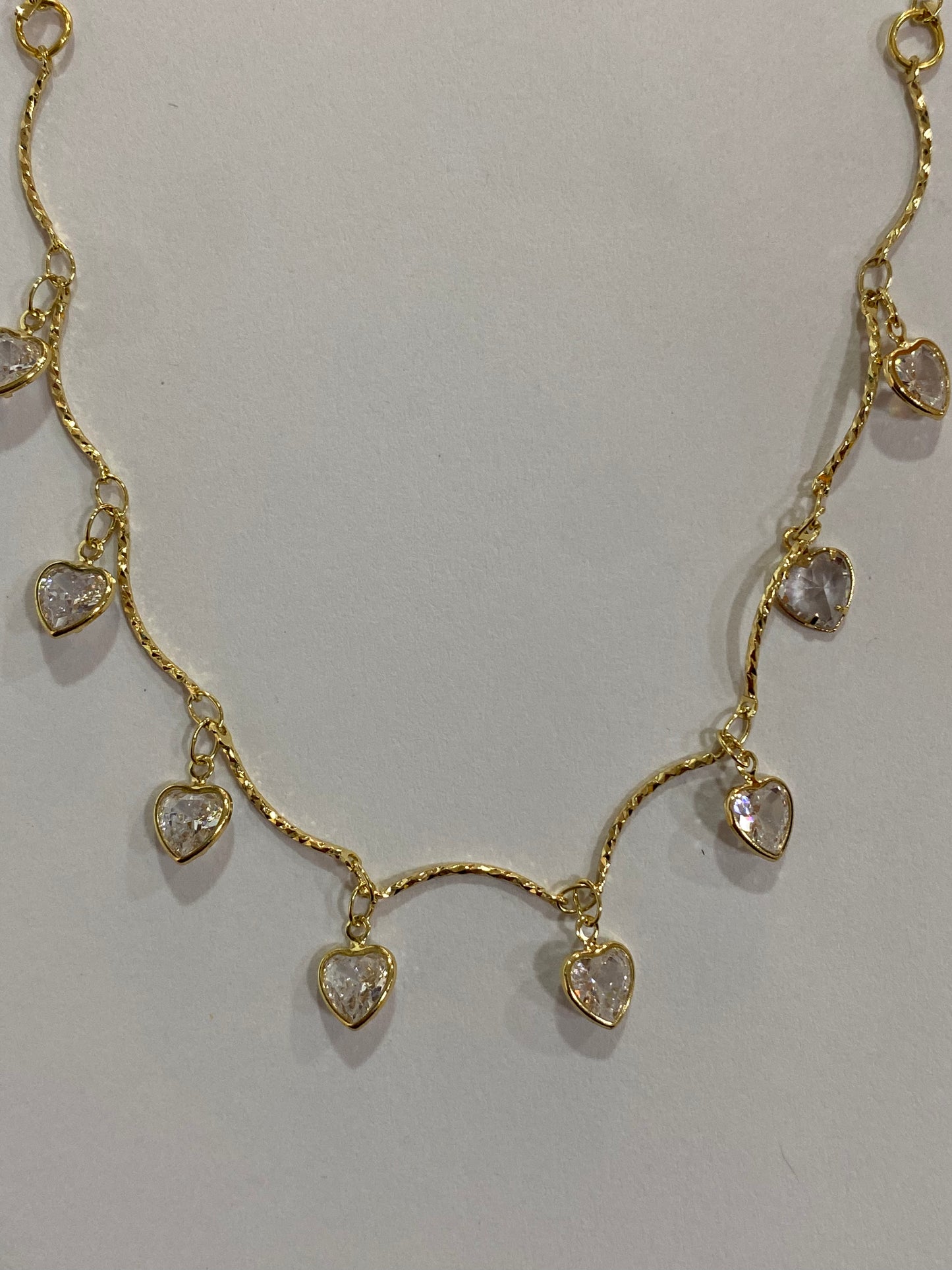 Collar de corazones con baño en oro