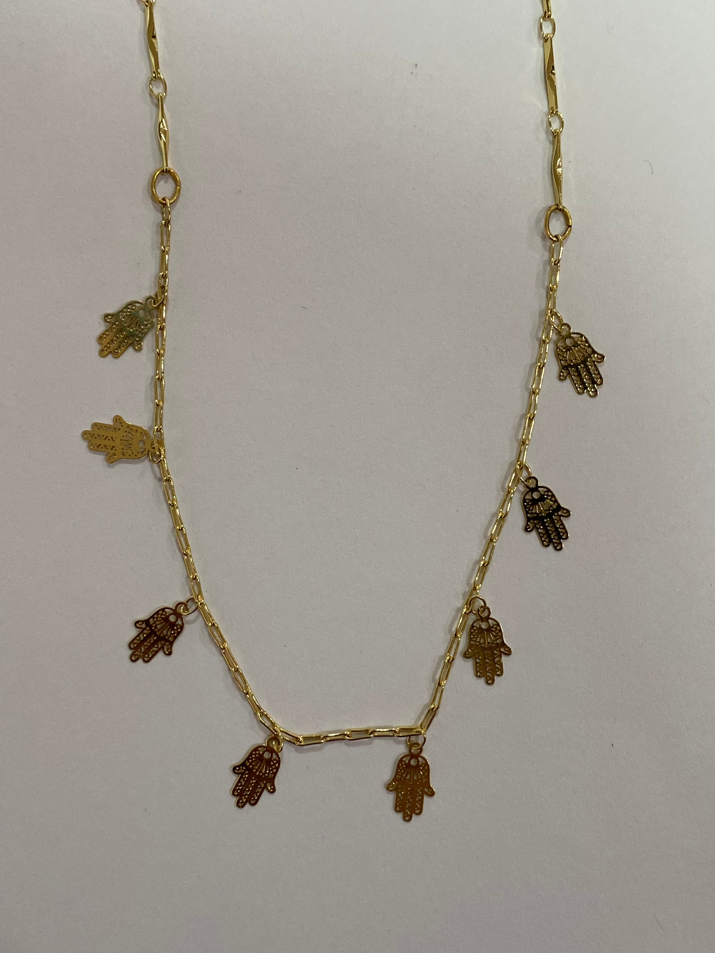 Collar de cobre bañado en oro con dijes de mano de Fátima