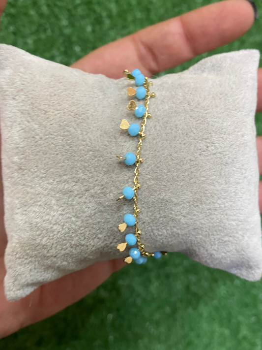 Pulsera con corazones con baño en oro