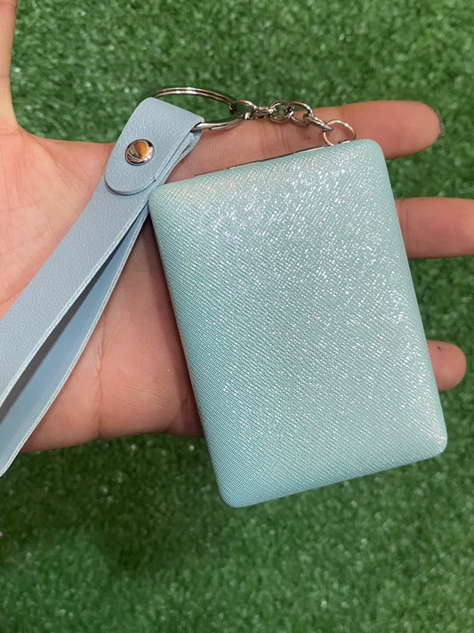 Espejo de mano rectangular celeste brillante