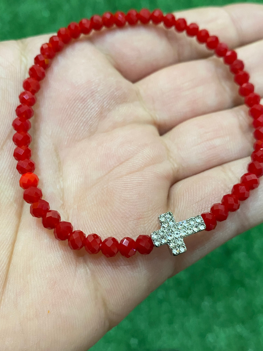 Pack de 3 pulseras rojas elásticas con dije de cruz
