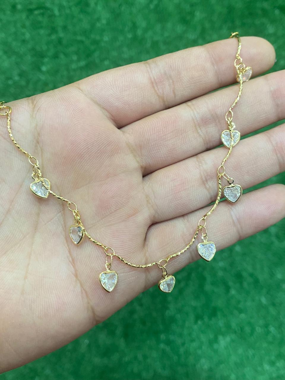 Collar de corazones con baño en oro