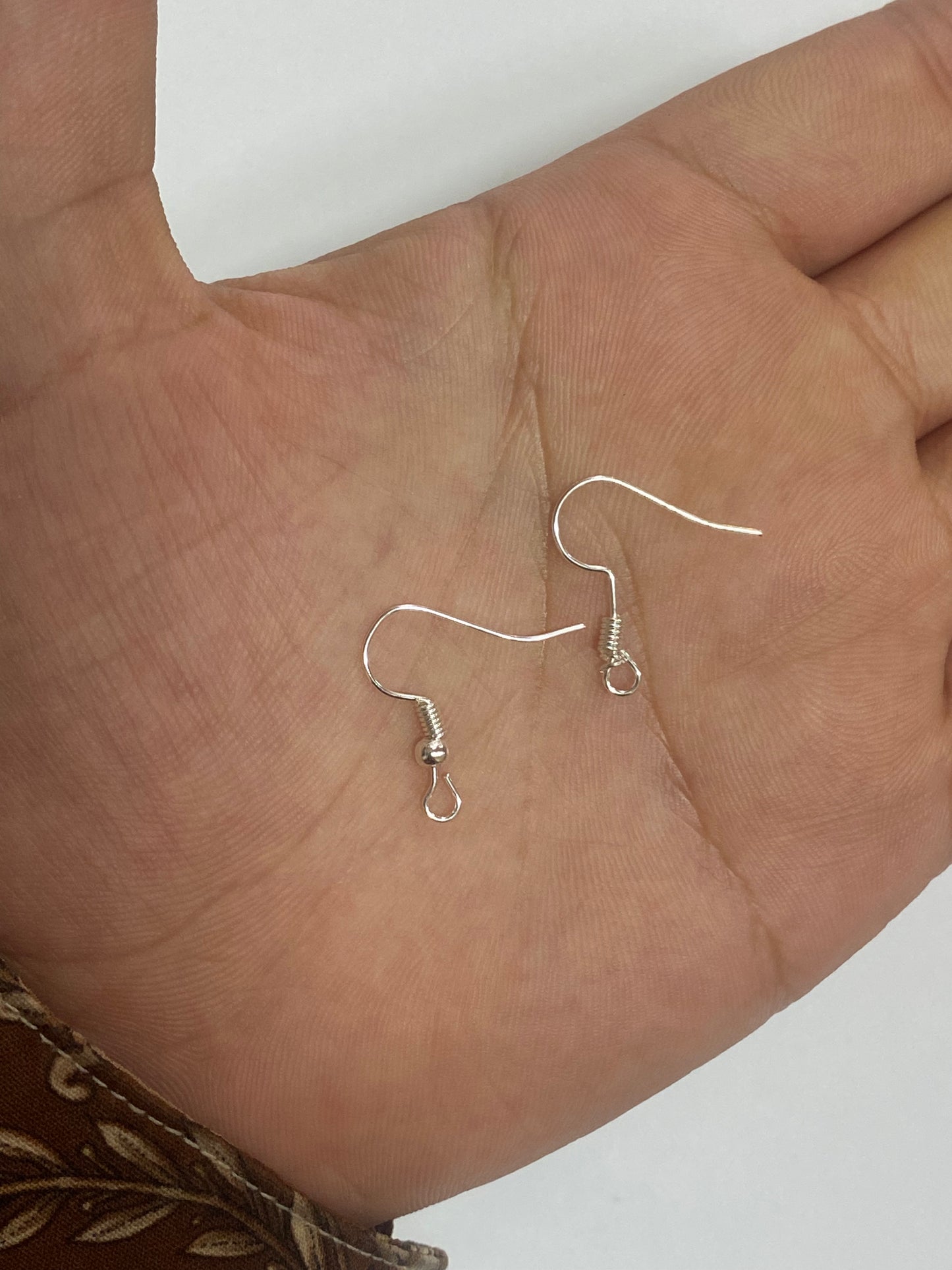 Ganchos para aretes plateados (20 unidades)
