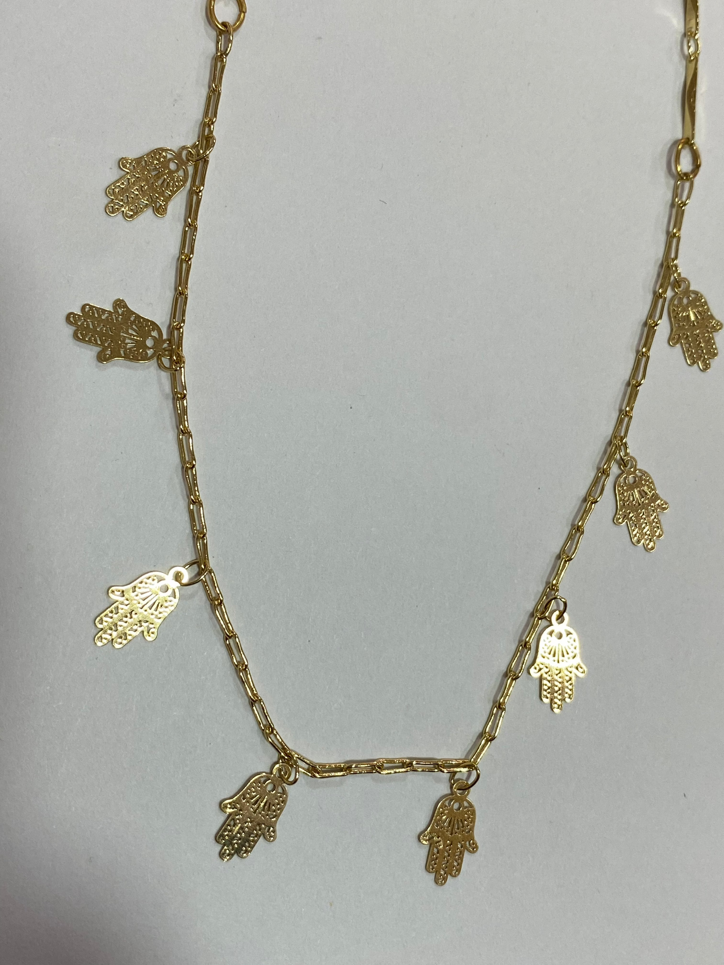 Collar de cobre bañado en oro con dijes de mano de Fátima