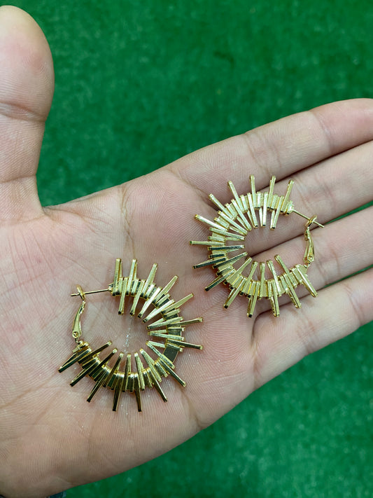 Argollas de puntas dorados en baño en oro