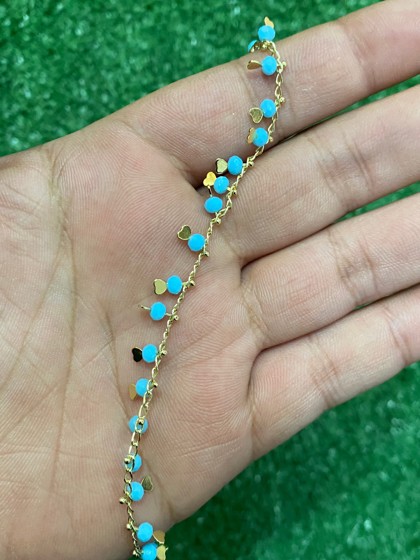 Pulsera con corazones con baño en oro