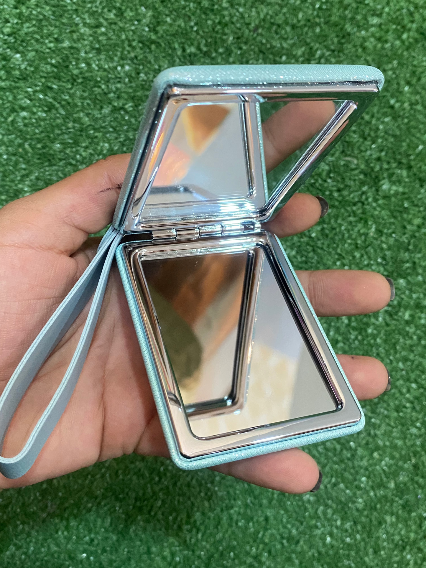 Espejo de mano rectangular celeste brillante